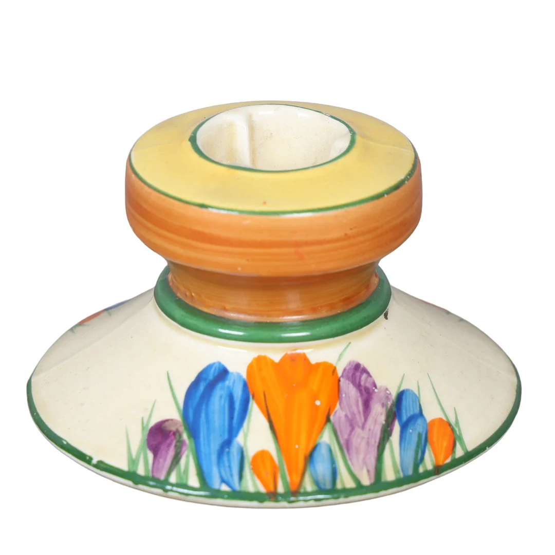 A CLARICE CLIFF CROCUS PATTERN CANDLESTICK. — European — Bishop & Miller