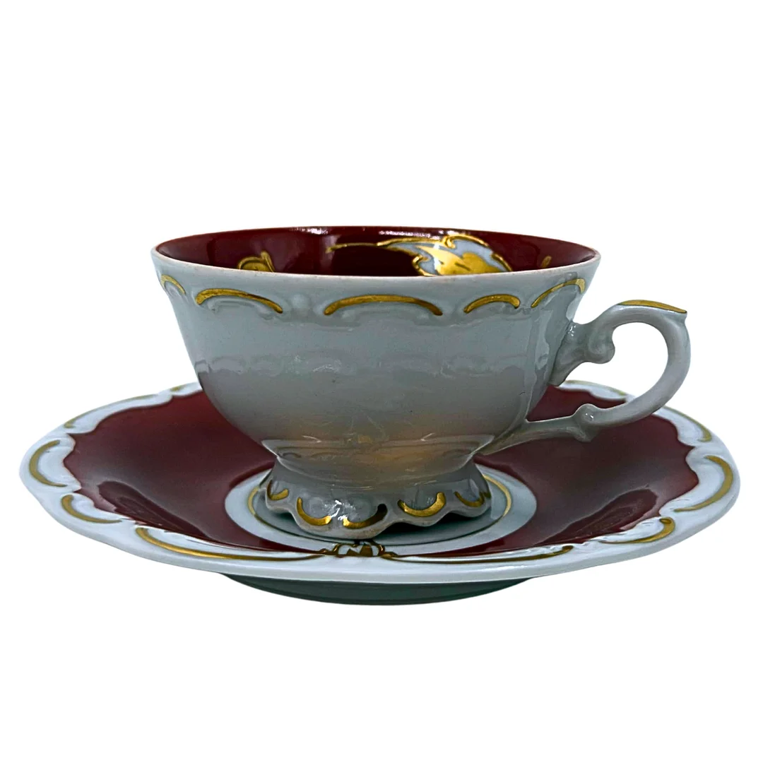 PORZELLANMALEREI KRÜGER. SAMMELTASSE MIT UNTERTASSE - 1930ER BIS 1950ER JAHRE. — European — Auktionshaus Stuber's Hammerschlag