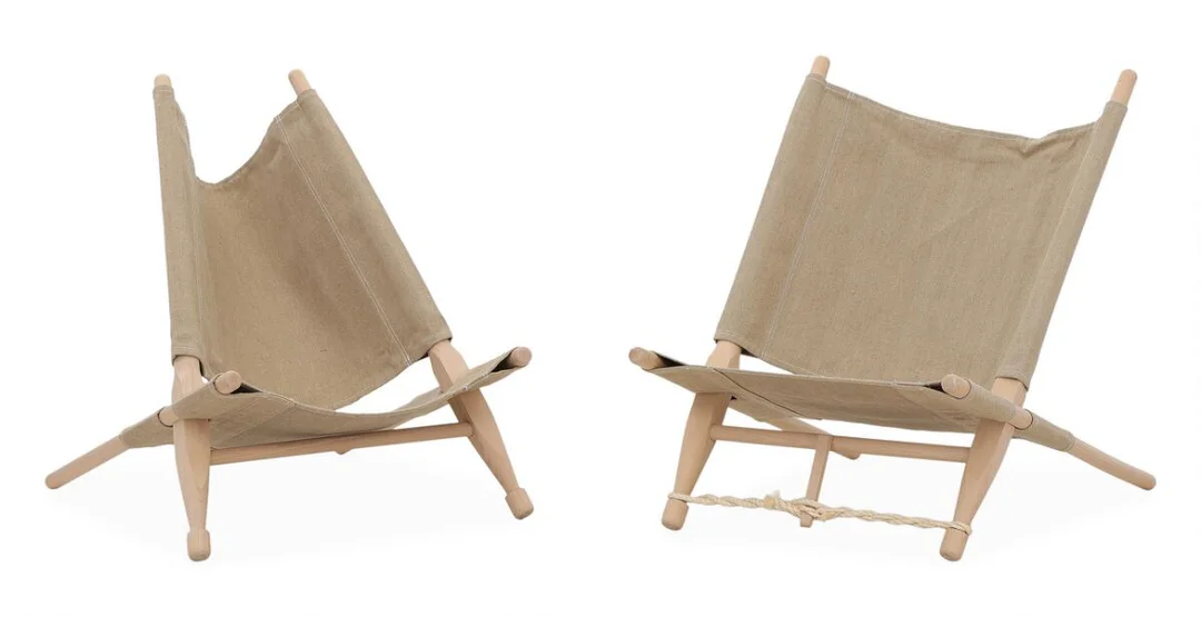 Ole Gjerløv-Knudsen: A pair of beech easy chairs. Seat and back with canvas. (2) — Modern Furniture — Bruun Rasmussen