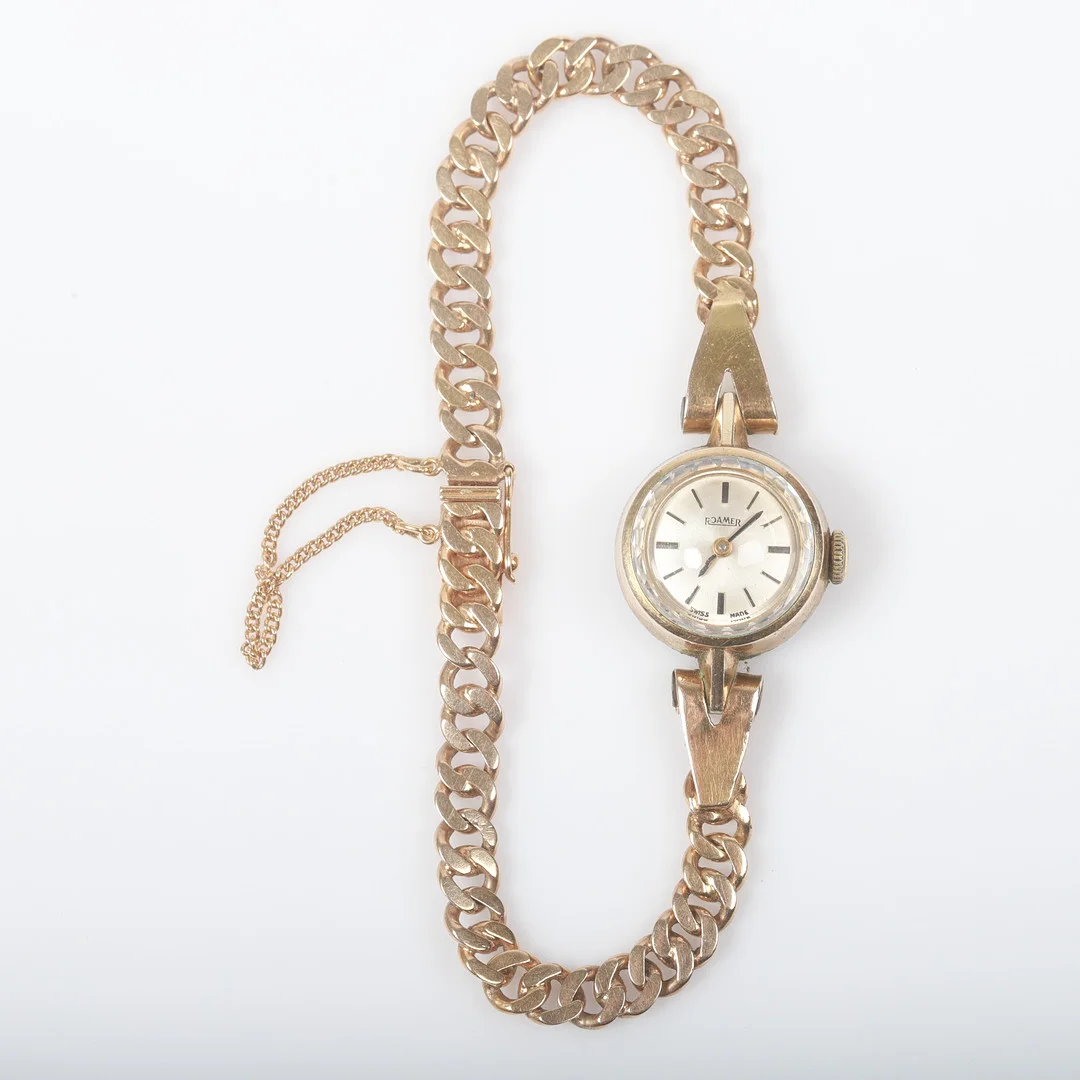 DAMARMBANDSUR, Roamer, förgyllt stål med länk av 18 K guld. — Wristwatches — Helsingborgs Auktionskammare