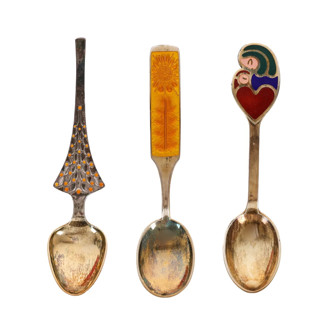 A. Michelsen: 3 Christmas spoons, 1965, 1967 and 1968. of gilded sterling silver and enamel. (3) — Silver, bronze, copper and pewter/Silver flatware — Lauritz