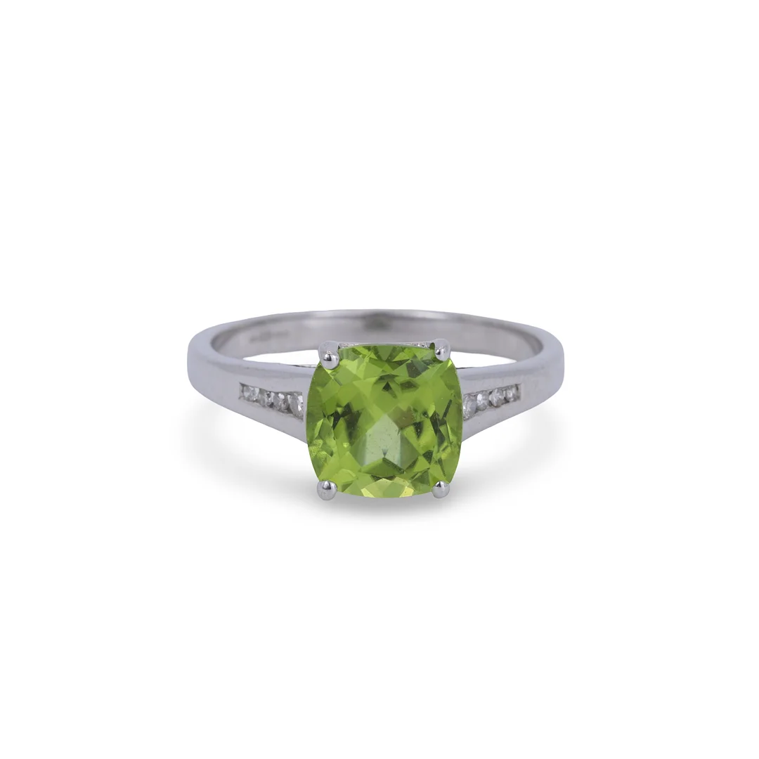 9CT GOLD PERIDOT AND DIAMOND RING. — Rings — Chalkwell Auctions