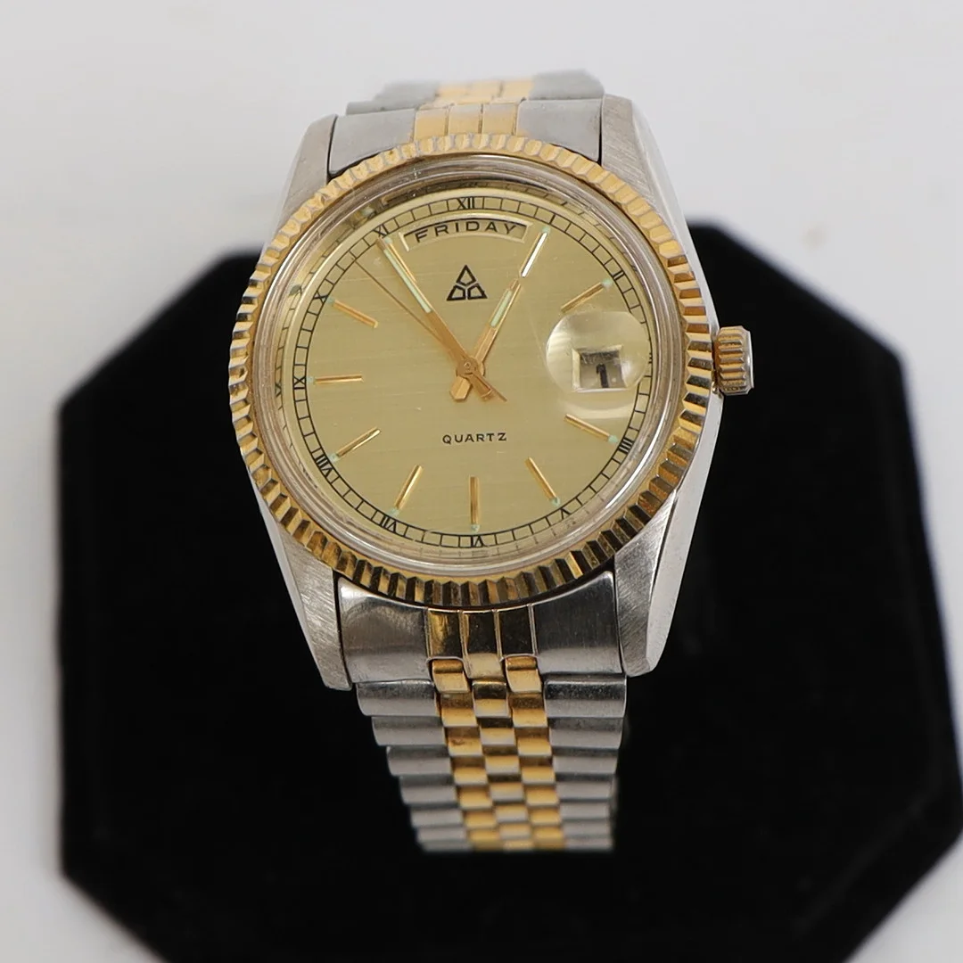 HERRARMBANDSUR, delvis förgyllt stål. — Wristwatches — Falun Auktionsbyrå