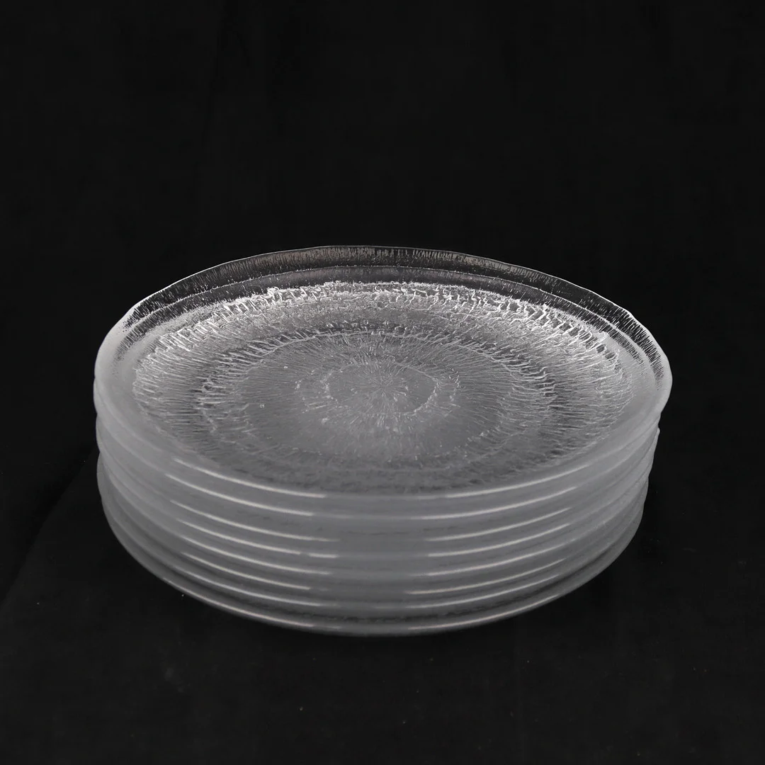 TAPIO WIRKKALA. Assietter, 8 st, "Solaris", glas, Iittala, Finland. — Utility glass — Höganäs Auktionsverk