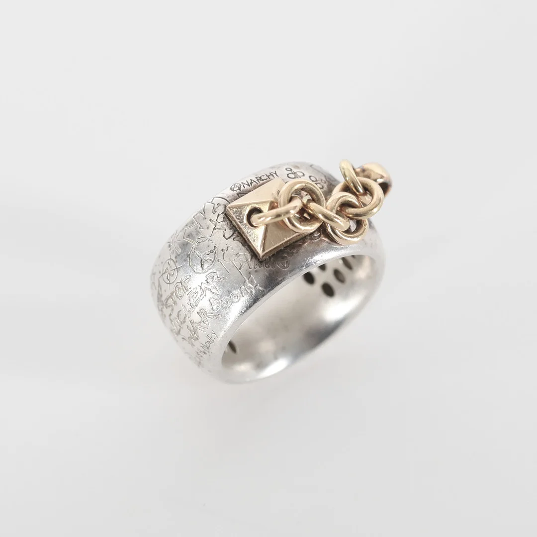 HÅKAN ORRLING. f 1971, Ring "Nubien Heritage Graffiti", silver och 18K guld, Art Metall, Helsingborg. — Rings — Auktionsverket Engelholm