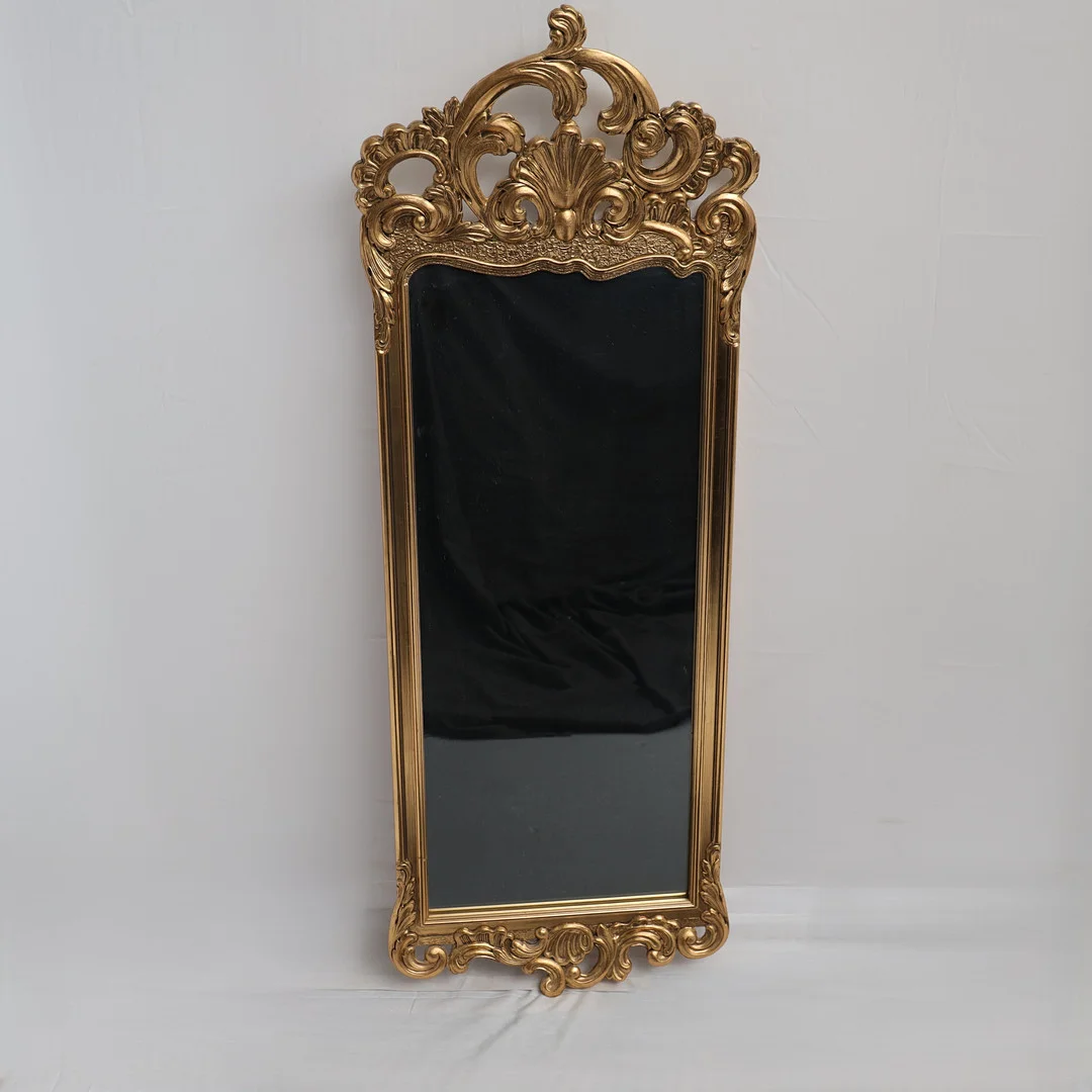SPEGEL, 1900-tal, bronserad och förgylld. Genombrutet krön. — Mirrors — Falun Auktionsbyrå