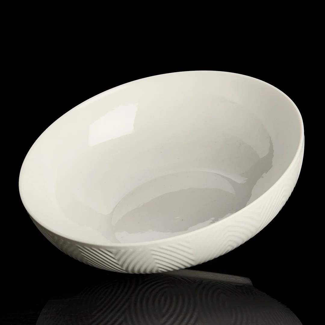 AXEL SALTO (DANMARK, 1889–1961). Skål, porslin, Royal Copenhagen 1959, räfflad dekor av blad. — European — Crafoord Auktioner Stockholm