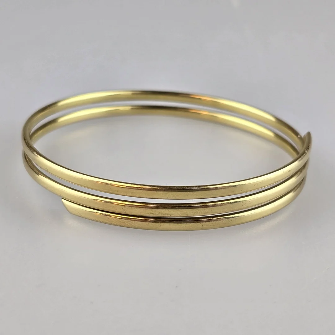 18K-GOLDARMREIF in Form einer Spirale. — Bracelets — Auktionshaus Blank