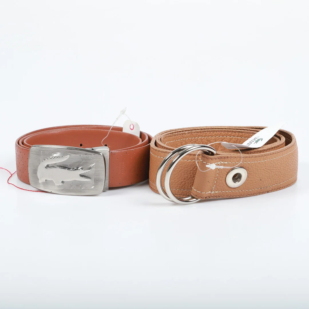 BÄLTEN, 2 stycken, skinn, Lacoste. — Vintage & Designer Fashion — Helsingborgs Auktionskammare