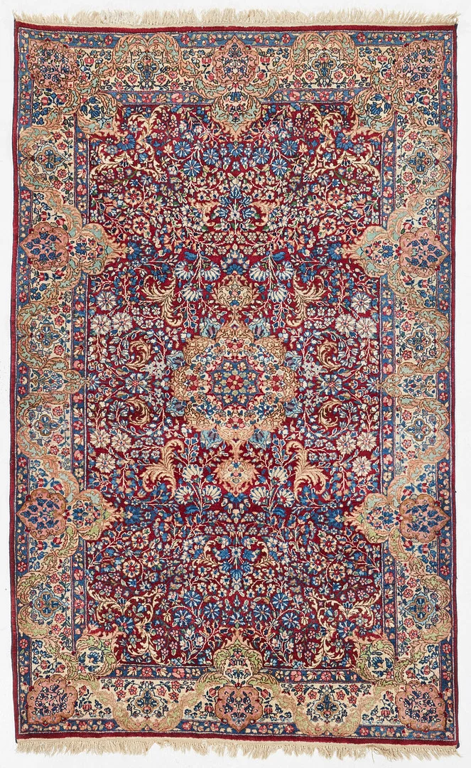 ORIENTMATTA, semiantik Kirman, "mille fleurs", ca 230 x 137,5 cm (inklusive kortsidornas slätväv). — Oriental Carpets & Textiles — Stockholms Auktionsverk Magasin 5