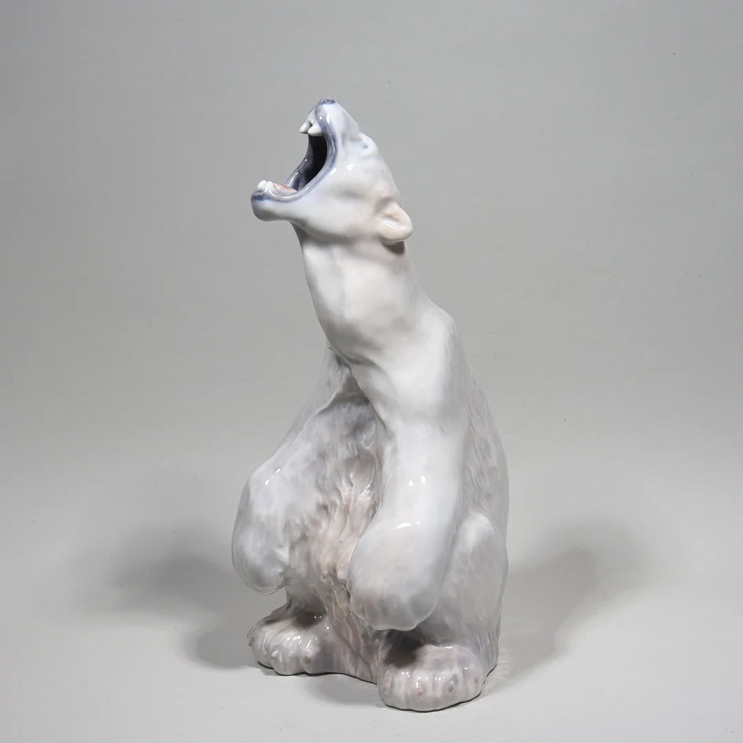 CARL FREDERIK LIISBJERG. för Royal Copenhagen, figurin #502, rytande isbjörn. — European — Markus Auktioner