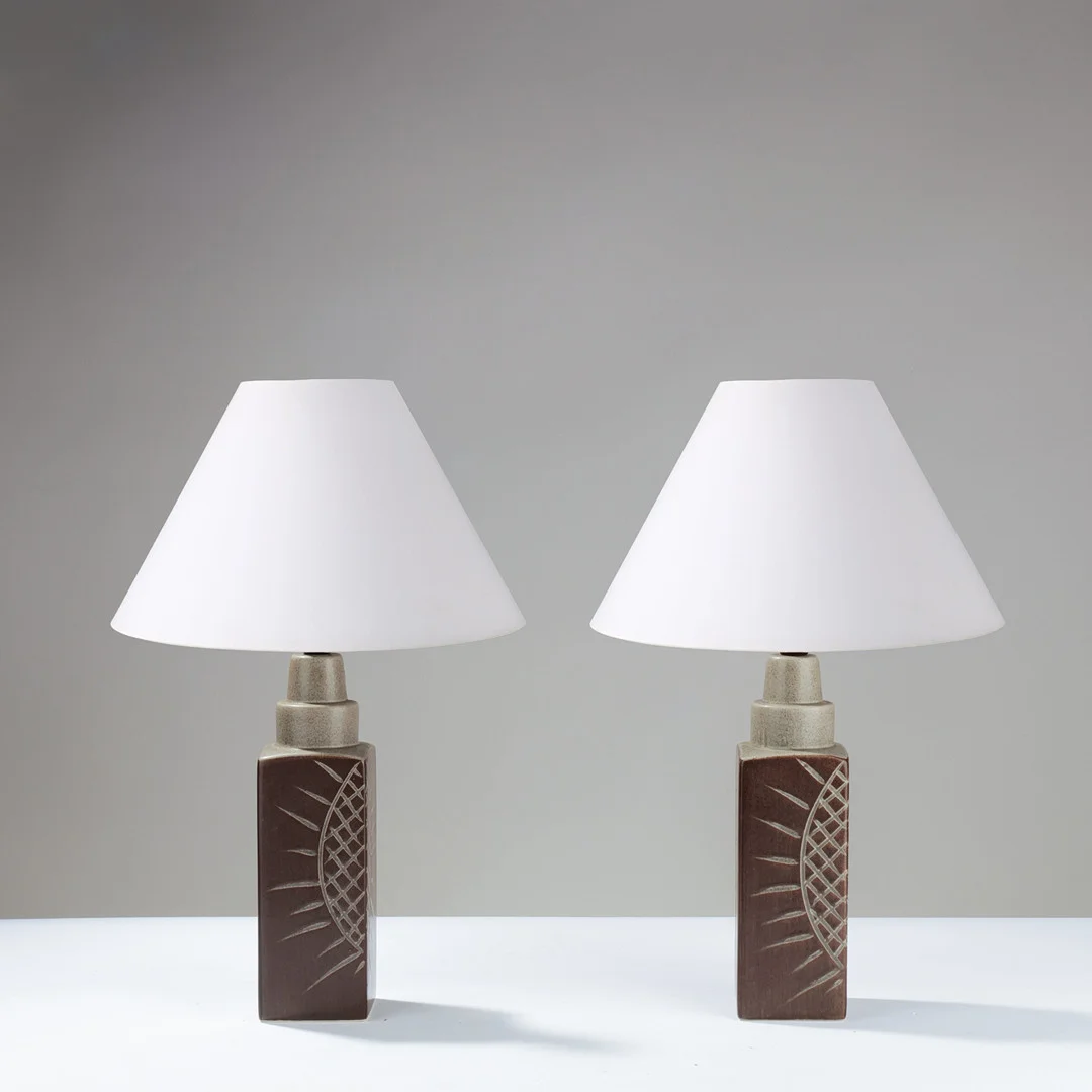 PAIR of ceramic table lamps glazed in blue-grey and brown shades, bodies decorated with abstract reliefs, Danish lamp manufacturer, second half of the 20th century, (2). — Table Lamps — Palsgaard Kunstauktioner