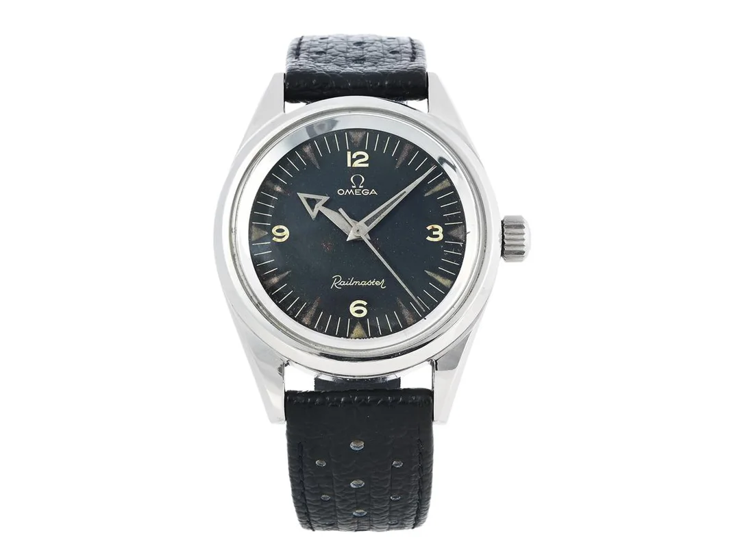 OMEGA, Railmaster, Cal 284, Serie nr. 15572571, Ref nr. CK 2914, Boett nr. 2914-1 SC (HF), herrur, 38 mm, stål (Staybrite), manuell, plexiglas, servicebehov, skadad urtavla/visare, svarvad bakboett, läderband, ca 1957. — Klockor/Omega — Kaplans