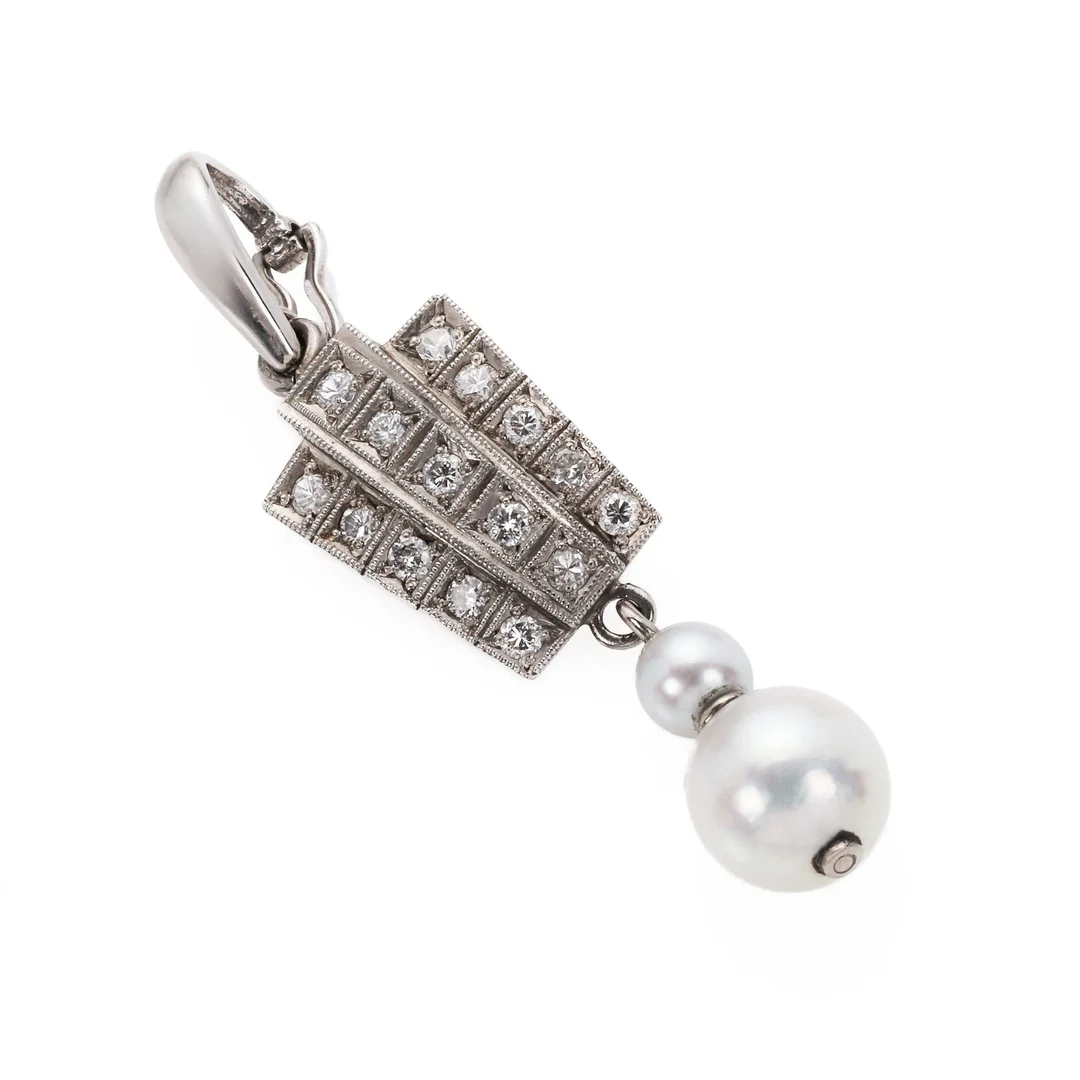 A diamond and pearl pendant of platinum and 14k white gold. — Jewellery/Necklaces, pendants — Lauritz