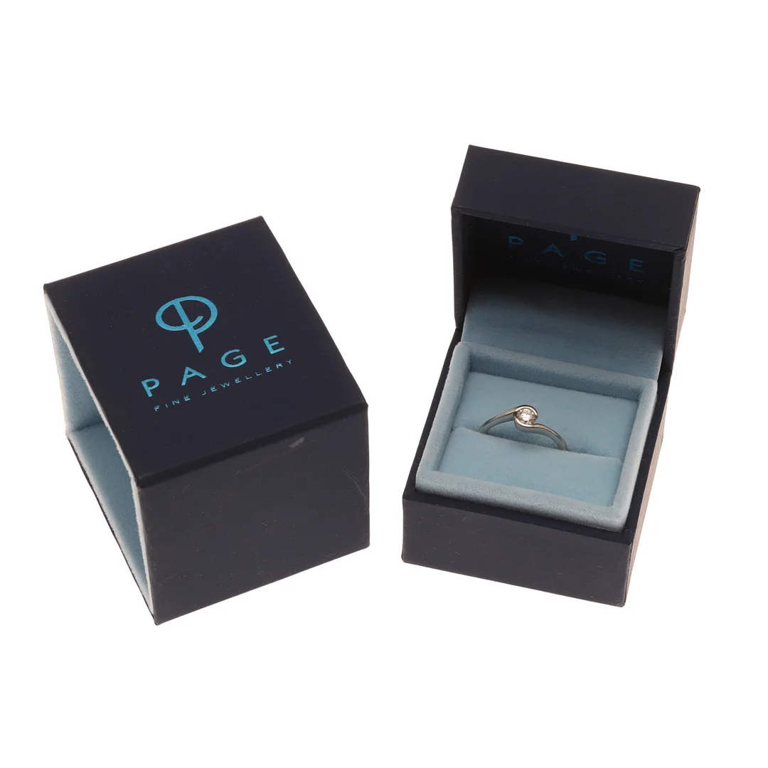 AN 18CT GOLD AND DIAMOND SOLITAIRE RING. — Rings — Lawrences Auctioneers