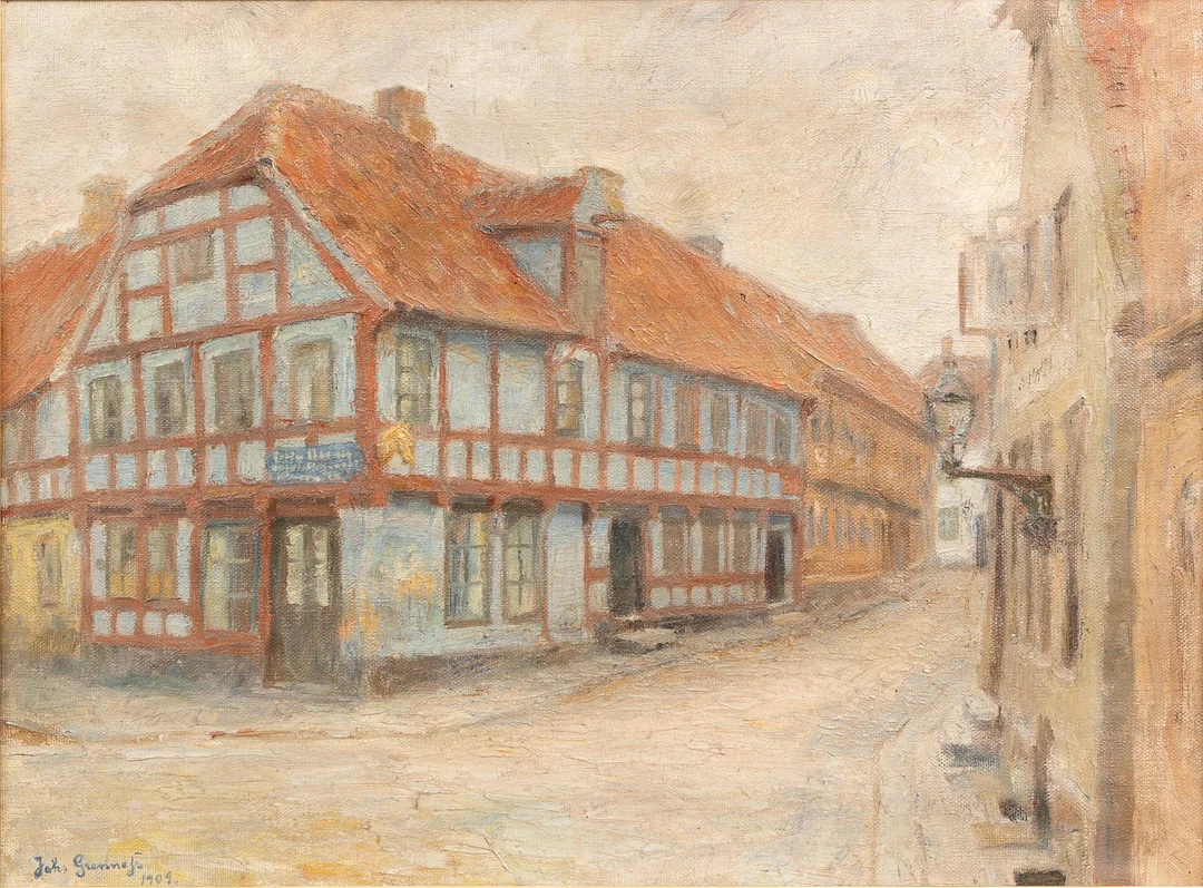 JOHANNES GRENNESS (DANMARK, 1875-1963). Gatubild med korsvikeshus, olja på duk, signerad och daterad 1904. — Paintings — Garpenhus Auktioner