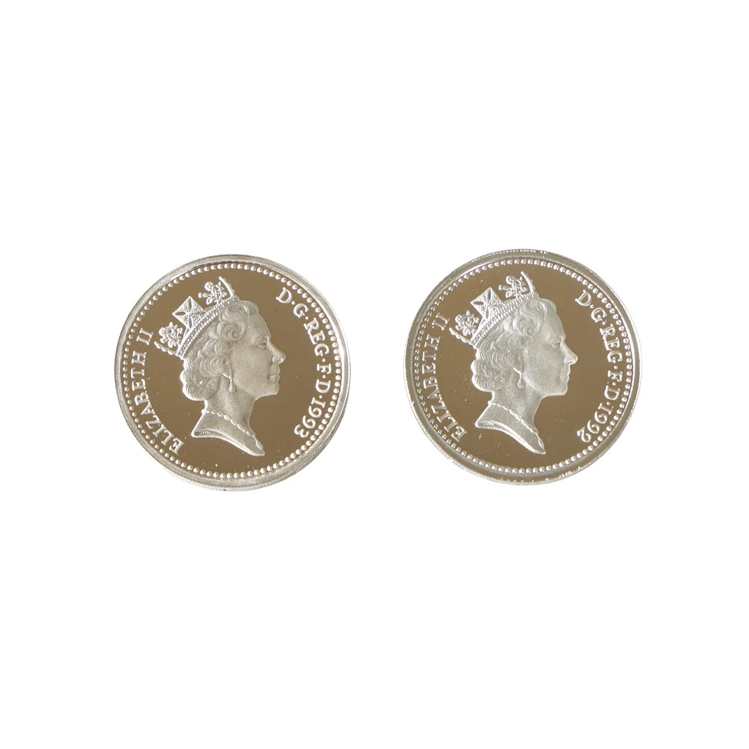 TWO ROYAL MINT UNITED KINGDOM SILVER PROOF ONE POUND COINS (2). — Coins & Banknotes — Bishop & Miller