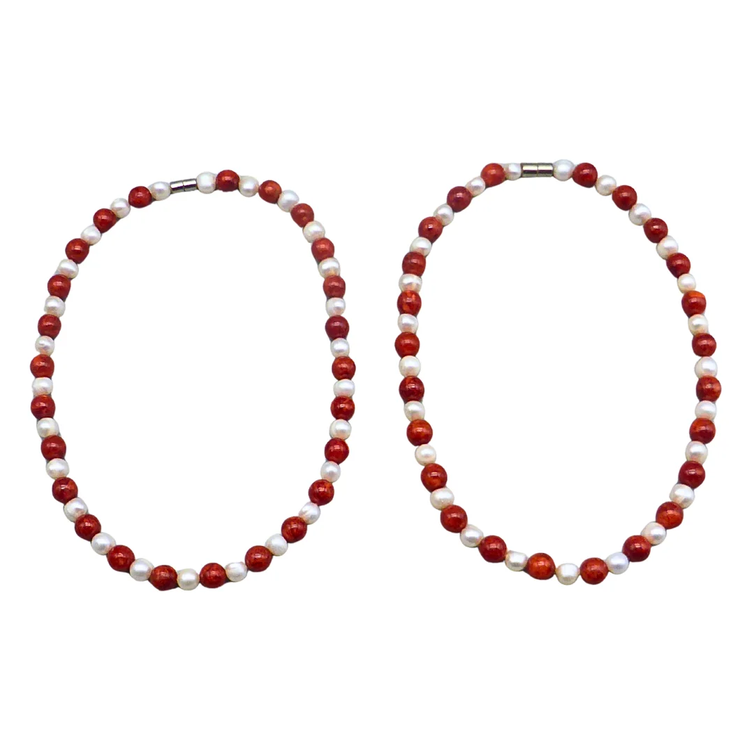 ZWEITEILIGES HALSKETTEN-SET MIT SCHAUMKORALLE UND PERLEN. — Necklace — Auktionshaus Stuber's Hammerschlag
