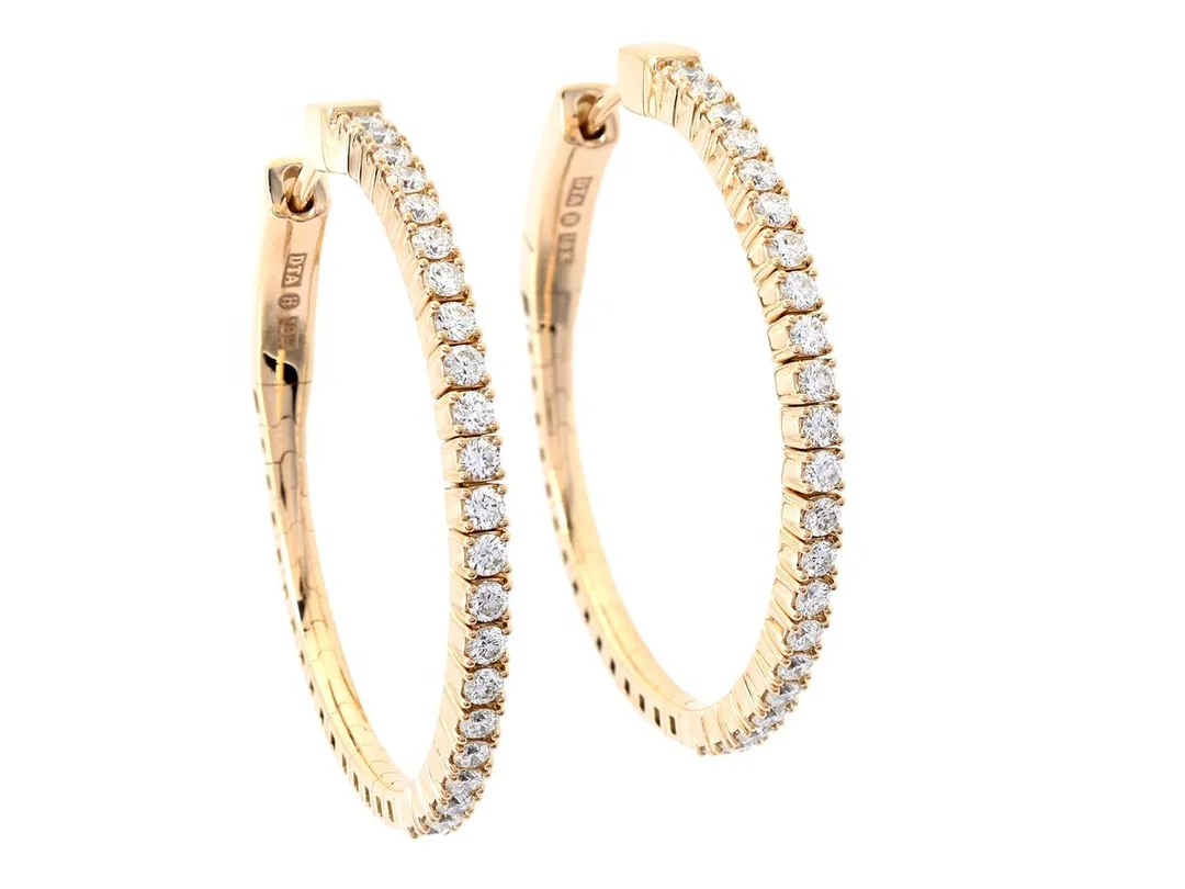 ÖRRINGAR, 18K guld, 44 briljantslipade diamanter ca 0,82 ctv, ca TW-W/VVS-VS, stift, diameter 30 mm, vikt 8,5 g. — Smycken/Örringar — Kaplans