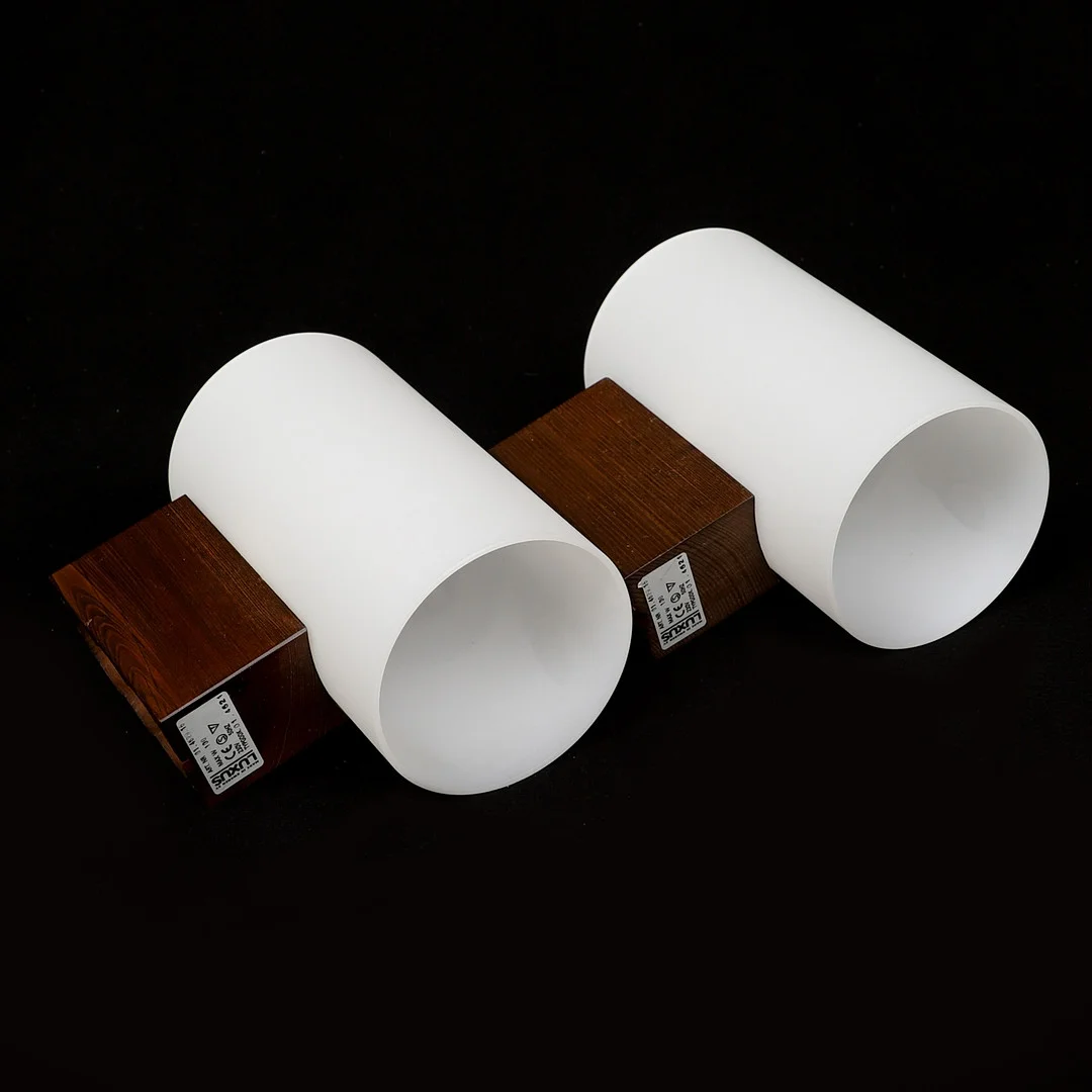 UNO & ÖSTEN KRISTIANSSON. Vägglampor, 1 par, Luxus, Vittsjö. — Wall Lights — Crafoord Auktioner Malmö