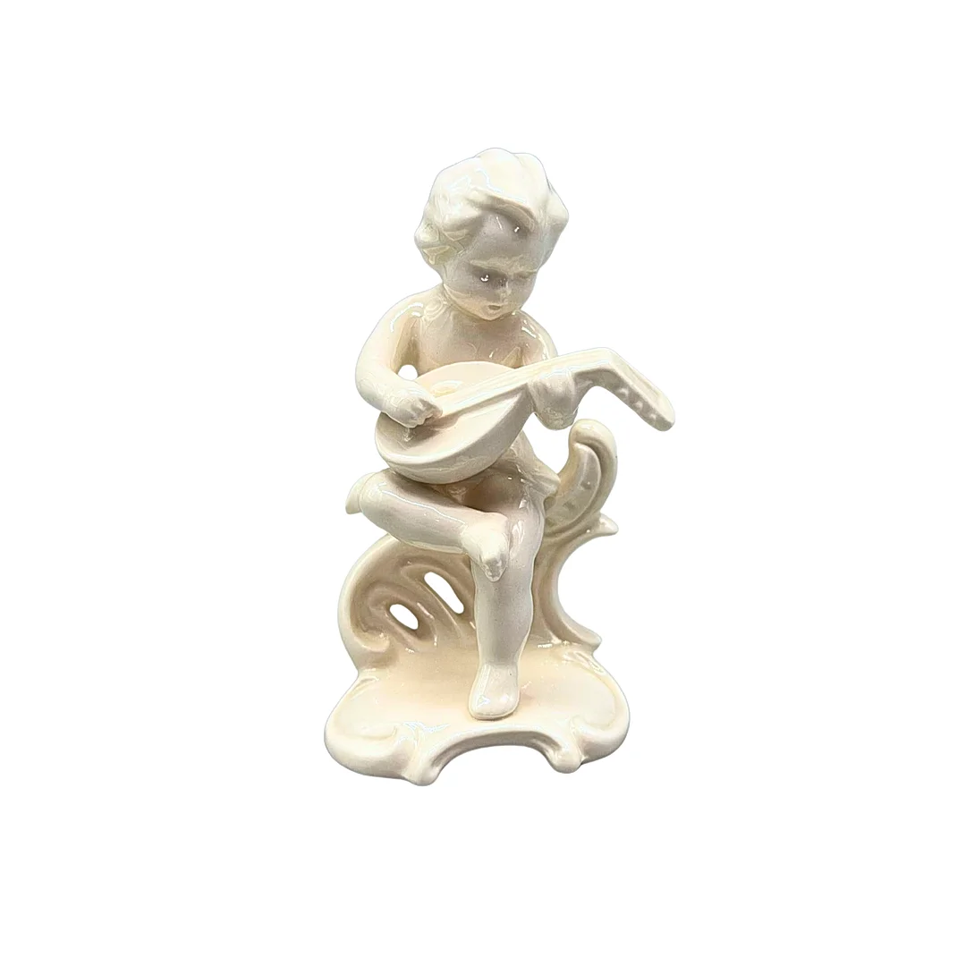 GOEBEL FIGUR, KIND MIT GITARRE AUS PORZELLAN. — European — Auktionshaus Stuber's Hammerschlag