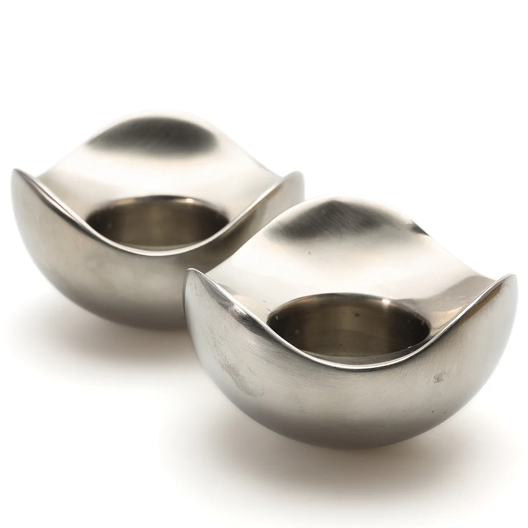 LJUSLYKTOR, ett par, bortsad stål, "Bloom", Georg Jensen, Danmark. — Candlesticks — Auktionsmagasinet Vänersborg