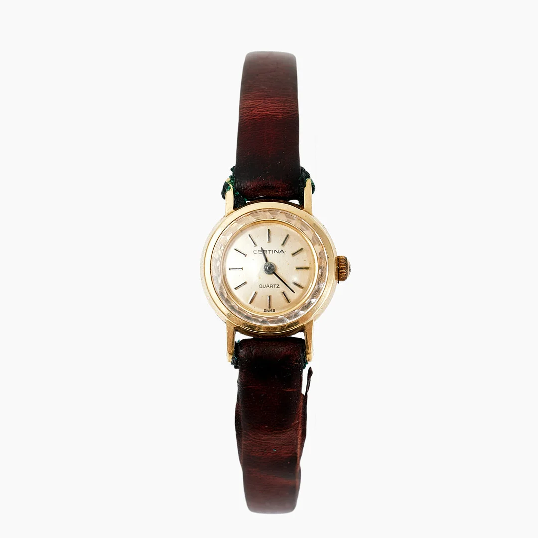 CERTINA Quartz (Swiss), boett i 14 k guld, ca 16 mm, 1980-tal. — Wristwatches — Stockholms Auktionsverk Sickla