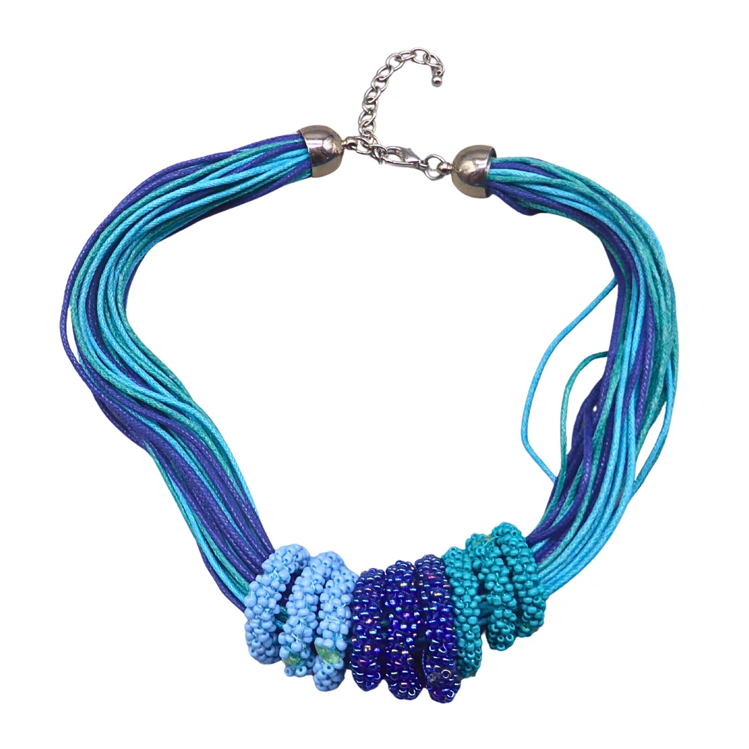 MEHRSTRÄNGIGE HALSKETTE MIT PERLENRINGEN. — Necklace — Auktionshaus Stuber's Hammerschlag