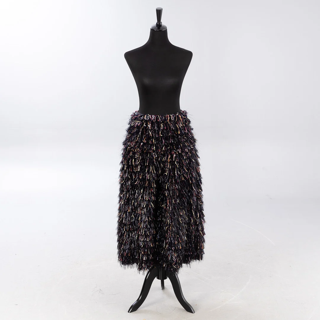 CHANEL. Fransenrock mit glänzendem Effekt, FR 38. — Vintage & Designer Fashion — Stockholms Auktionsverk Hamburg