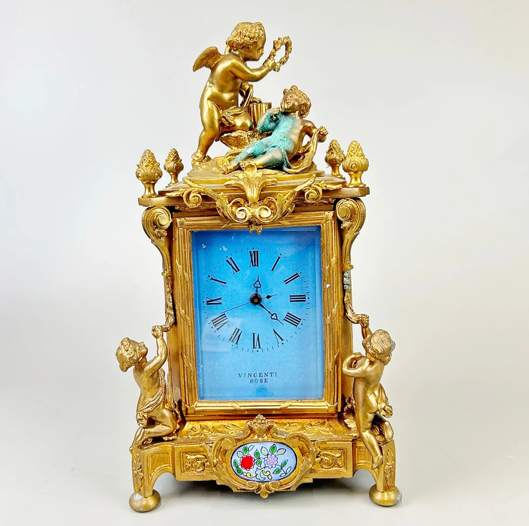 GILT BRONZE CHERUB CARRIAGE CLOCK. — Carriage & Miniature Clocks — Chalkwell Auctions
