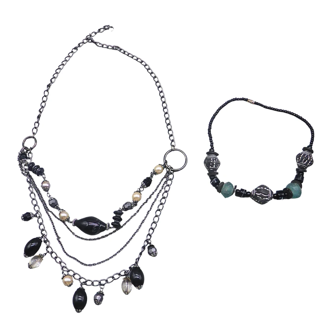 SET AUS ZWEI DUNKLEN HALSKETTE. — Jewellery — Auktionshaus Stuber's Hammerschlag
