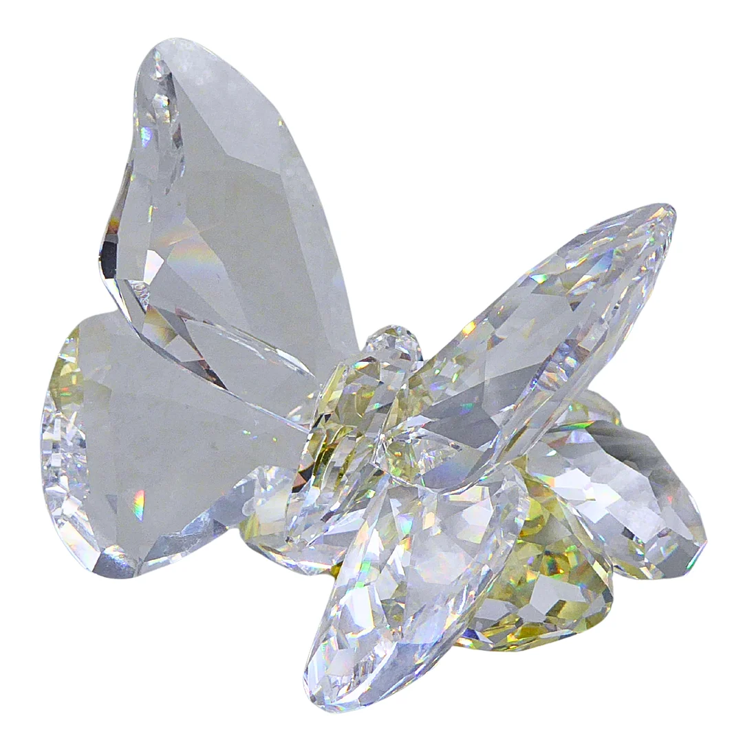 SWAROVSKI SCHMETTERLING AUF EINER BLÜTE. — Art glass — Auktionshaus Stuber's Hammerschlag