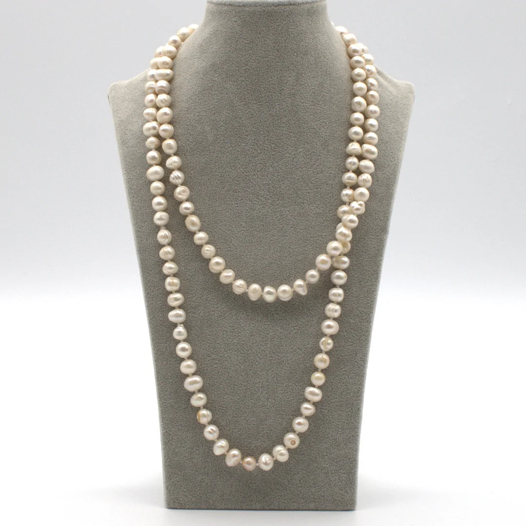 SÜSSWASSER PERLENKETTE VINTAGE HANDGEKNÜPFT UND STÜCKVERKNOTET. — Necklace — Kunst- und Auktionshaus Kleinhenz