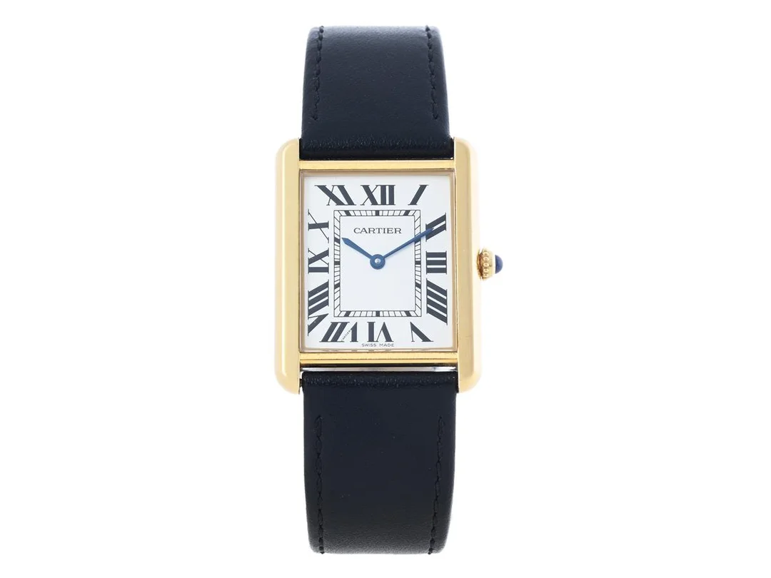 CARTIER, Tank Solo, Cal 690, Ref nr. W1018855, Boett nr. 750294NX/2742, herrur, 27,4 x 28 (34,8) mm, guld/stål, quartz, safirglas, läderband, originalspänne i 18K guld, cert, mars 2010, box (skadad), ytterkartong. — Klockor/Cartier — Kaplans
