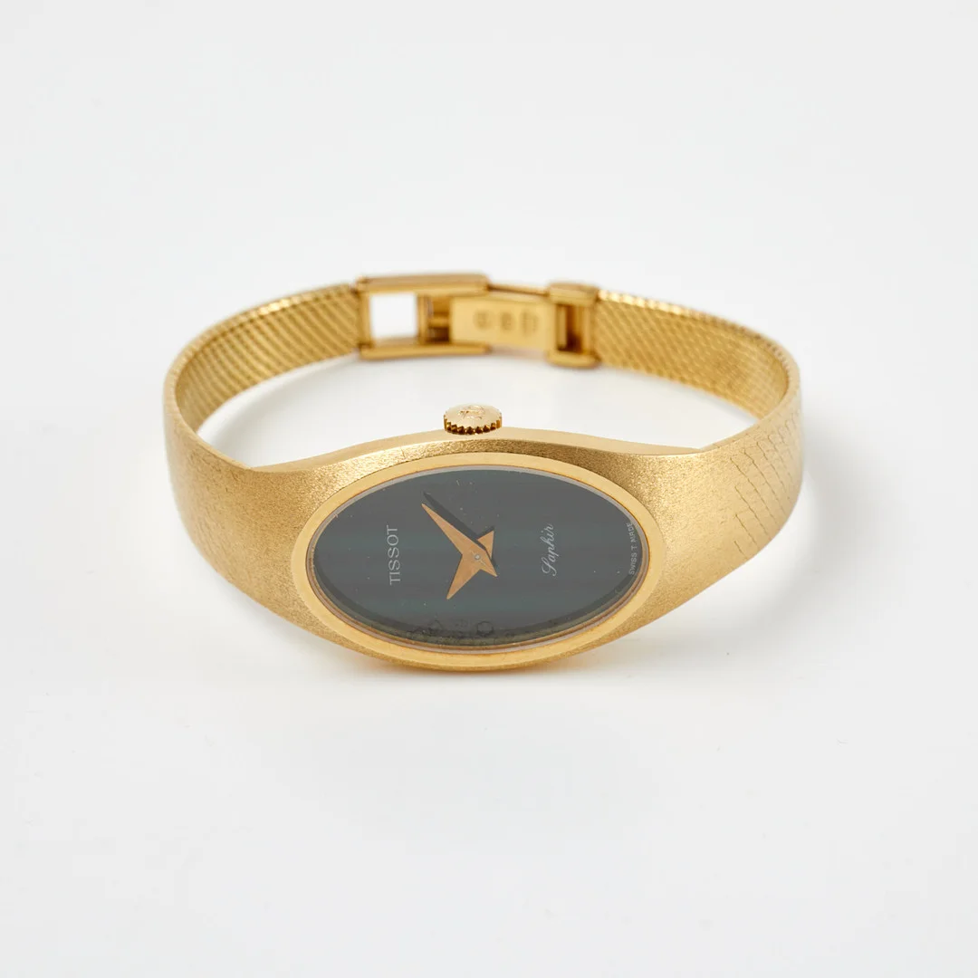 TISSOT Saphir (Swiss T Made), boett och länk i 18 k guld. — Wristwatches — Stockholms Auktionsverk Sickla