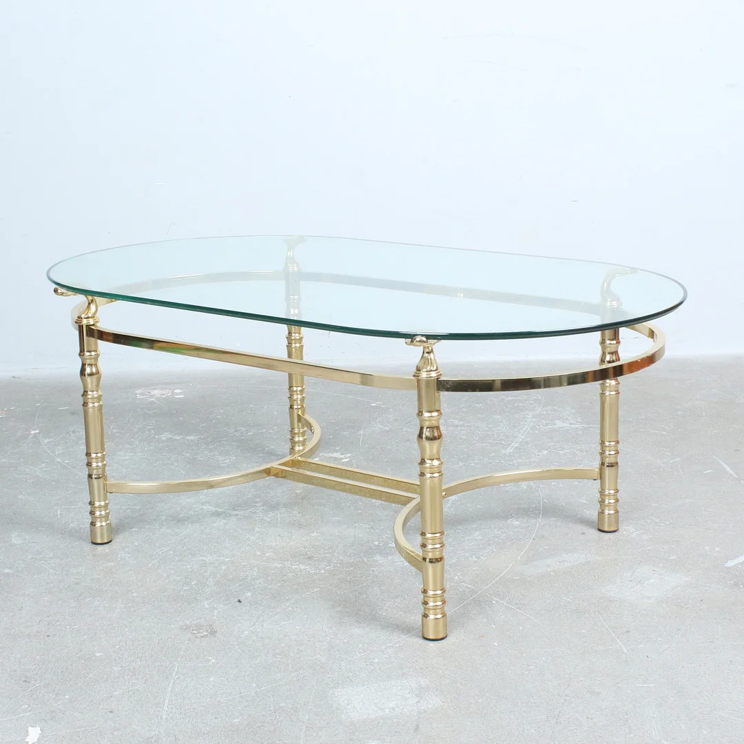 Couchtisch mit messingversehenen Metallrahmen mit dekorativen Säulenbeinen. — Coffee Tables — Stockholms Auktionsverk Düsseldorf/Neuss