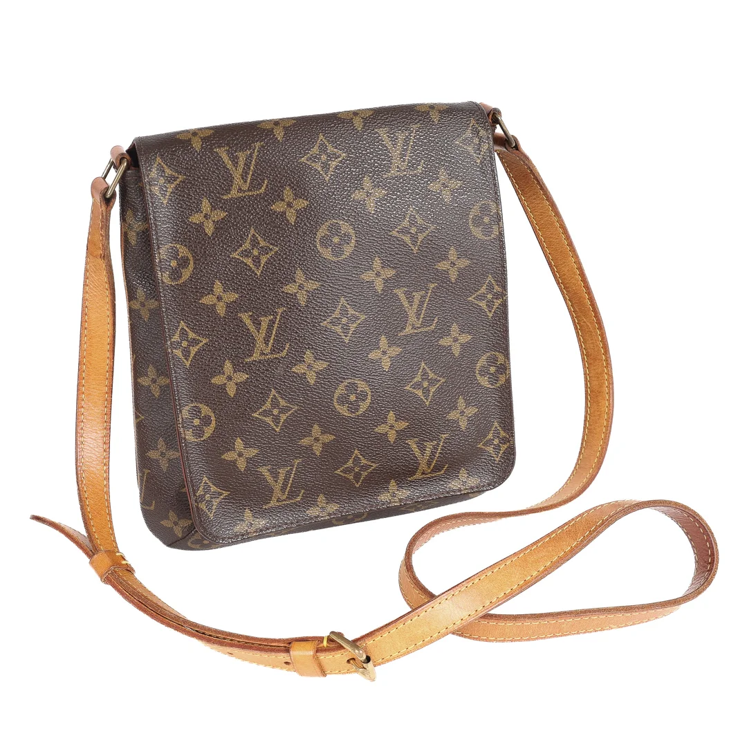 Louis Vuitton: A 'Musette' shoulder bag of brown monogram canvas. France 2003. — Clothing, shoes and accessories/Bags — Lauritz