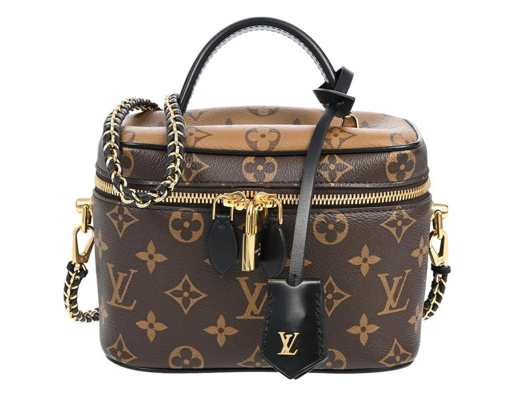 LOUIS VUITTON, VÄSKA, Vanity Bag, Monogram canvas Reversible, svart läder, guldfärgade beslag, 18x13x10 cm, avtagbar axelrem, hänglås och nycklar märkta 612, dustbag. Very Good Condition. — Accessoarer/Väskor — Kaplans