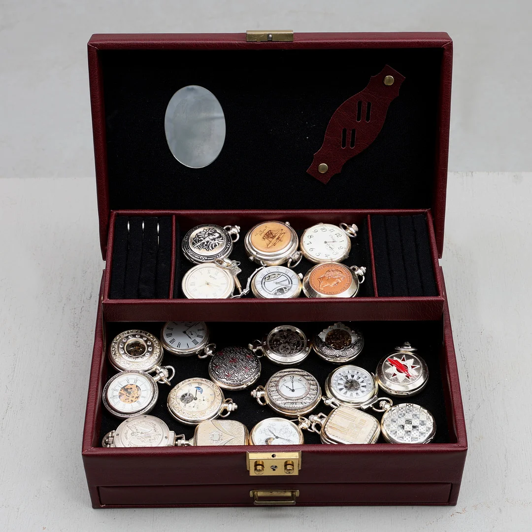 SAMLING FICKUR, 29 st, "The Heritage Collection", med skrin. — Pocket & Stop Watches — Gomér & Andersson Jönköping
