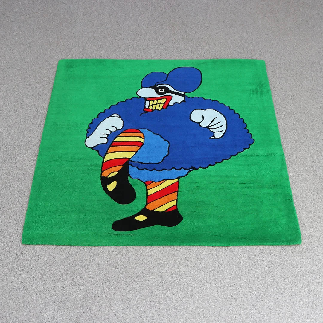 THE BEATLES, MATTA. Tuftad ull. "Blue Meanies". Samtida tillverkning. — European Carpets & Textiles — Skånes Auktionsverk