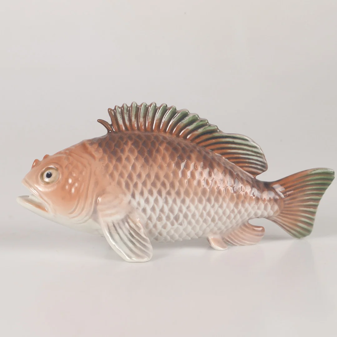FIGURIN, fisk, porslin, Dahl Jensen, Danmark. — European — Helsingborgs Auktionskammare