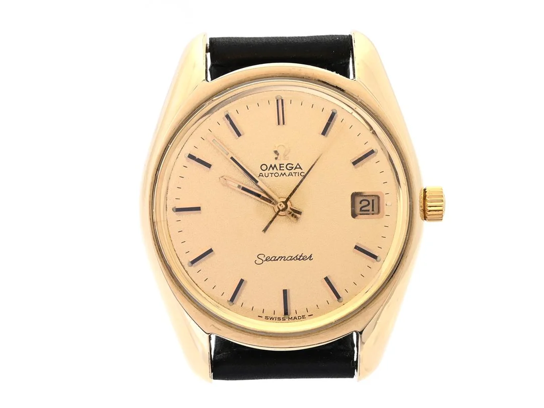 OMEGA, Seamaster (-Swiss Made-), Cal 565, Serie nr. 32964792, Ref nr. CD 166.067, Boett nr. 166.067 (C.B), herrur, 35,5 mm, guld på stål, automatisk, plexiglas, datum, läderband, ca 1970. — Klockor/Omega — Kaplans