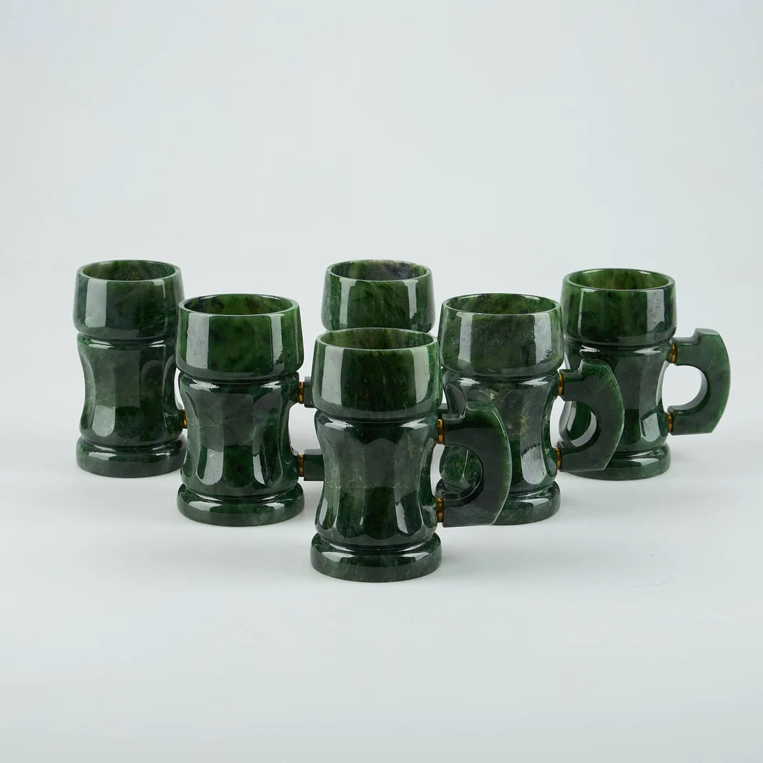 NEFRITBÄGARE, sex stycken. — Other collectables — Stockholms Auktionsverk Helsinki