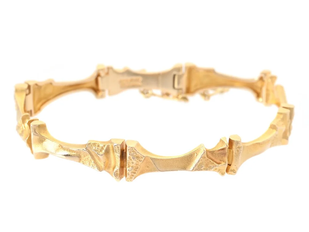 LAPPONIA, armband, Mukka, 18K guld, Björn Weckström, Finland 1989, längd 17,5 cm, vikt 21,7 g, säkerhetskedja. — Smycken/Armband — Kaplans