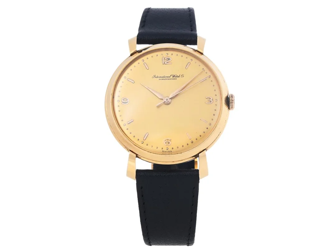 INTERNATIONAL WATCH Co, Schaffhausen, herrur, 36,5 mm, Cal 89 (Inca), Serie nr. 1332382, Boett nr. 1333032,18K guld, manuell, plexiglas, läderband, ca 1954. — Klockor/IWC — Kaplans