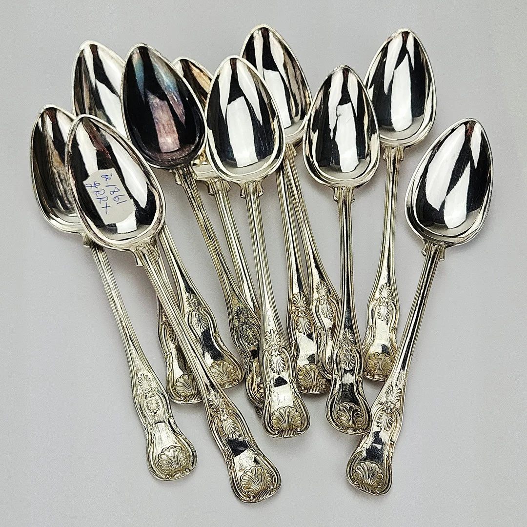 MATSKEDAR, 12 st, silver, "Engelsk snäck", Adolf Lilja, verksam 1842-1863, Stockholm 1860-1861, vikt ca. 555 gram. — Silver — Auktionshuset Thörner & Ek
