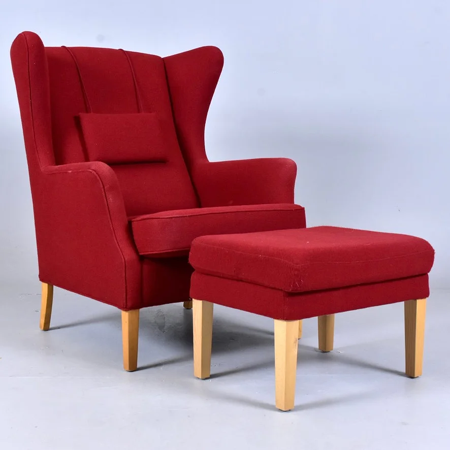 ORLA MØLGAARD-NIELSEN. ÖRONLAPPSFÅTÖLJ, med fotpall, "Jade", Nielaus, Danmark. — Armchairs & Chairs — Halmstads Auktionskammare