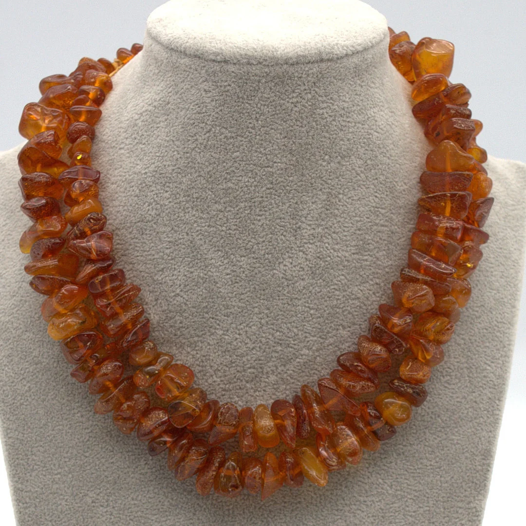 BERNSTEIN PERLENKETTE, POLIERTE PERLEN, NACH GRÖSSE SORTIERT, ENDLOSKETTE, VINTAGE, CA. 62 CM. — Necklace — Kunst- und Auktionshaus Kleinhenz
