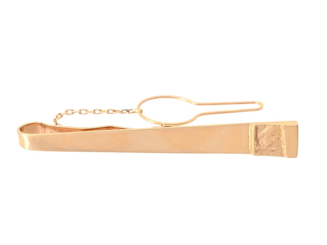 SLIPSNÅL, 18K guld, längd 50 mm, säkerhetskedja, vikt 5,1 g. — Smycken/Slipshållare — Kaplans