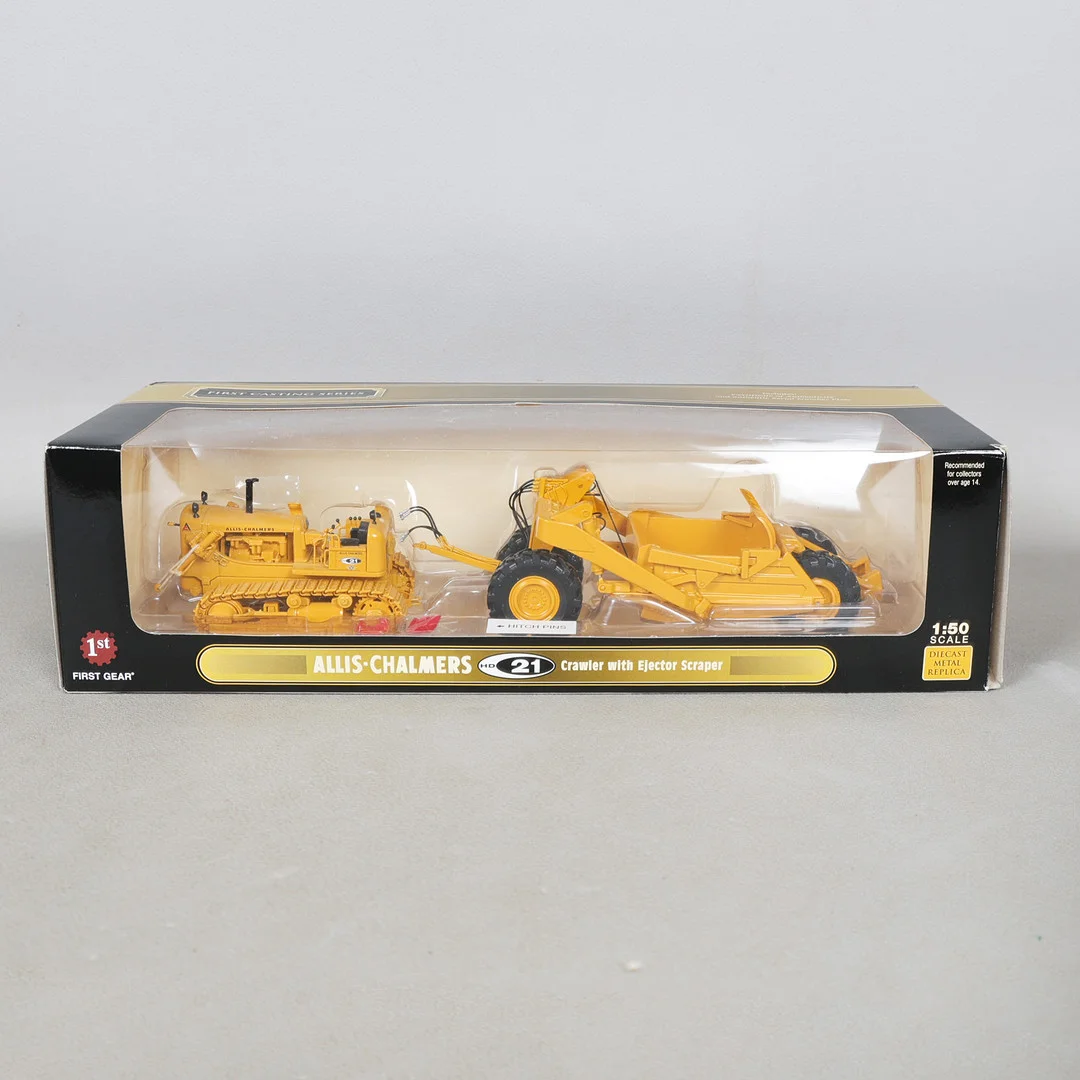 A FIRST GEAR LIMITED EDITION FIRST CASTING SERIES OF AN ALLIS-CHALMERS CRAWLER WITH EJECTOR SCRAPER. — Model cars — Bishop & Miller